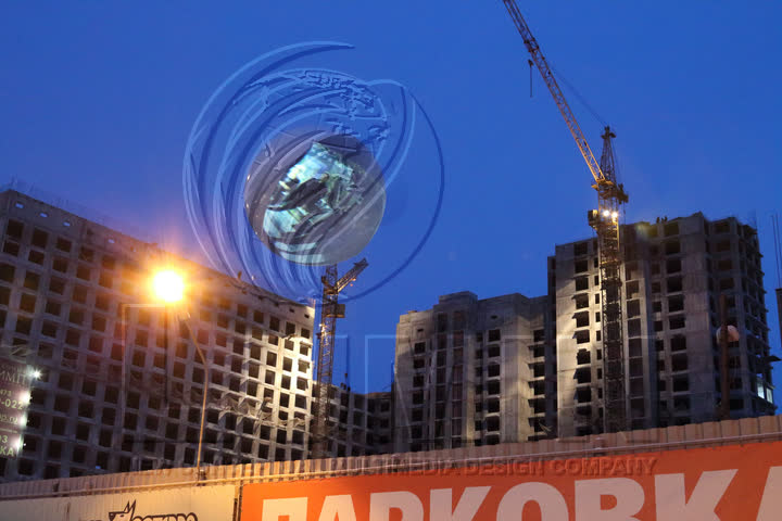 At dusk, next to new buildings