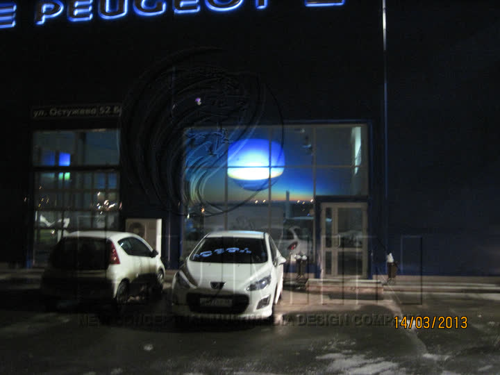 Car showroom, seen through the window